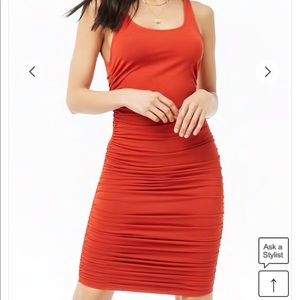 Deep orange ruched mini dress